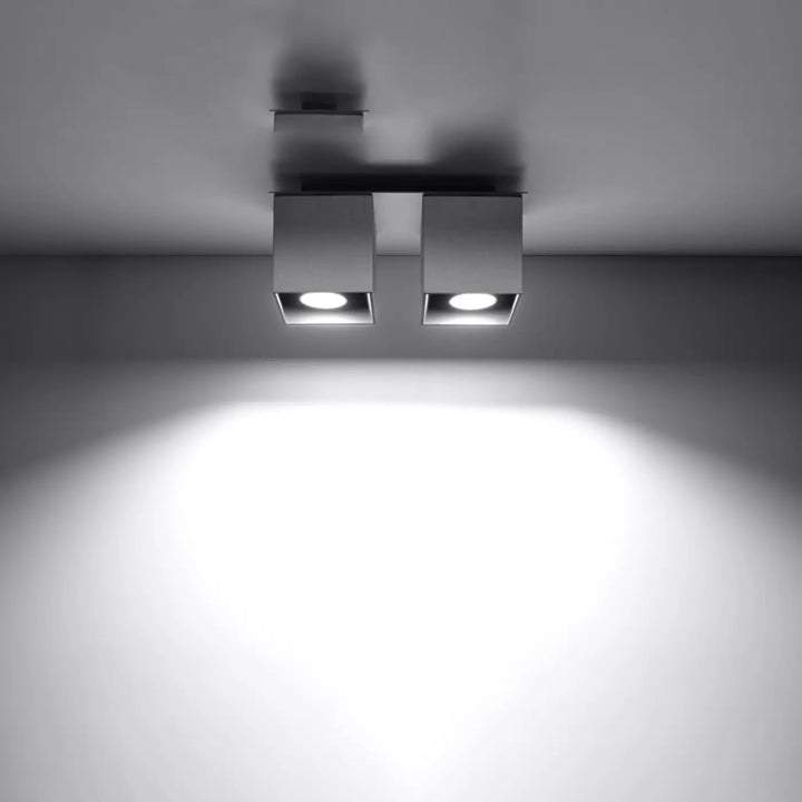 Luminaire Plafonnier gris allumée, vue rapprochée