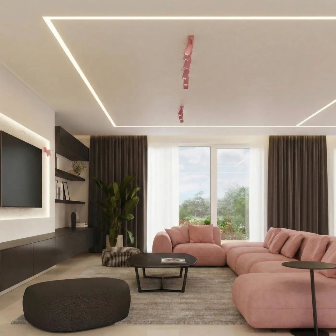 Plafonnier Ring rose à rampe de spots orientables dans un intérieur contemporain