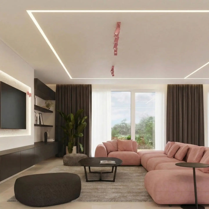 Plafonnier Ring rose à rampe de spots orientables dans un intérieur contemporain