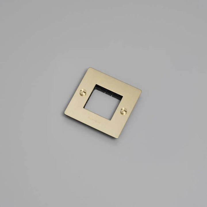 Plaque de finition Wall Plate 1 poste avec logo, finition laiton #couleur_dor