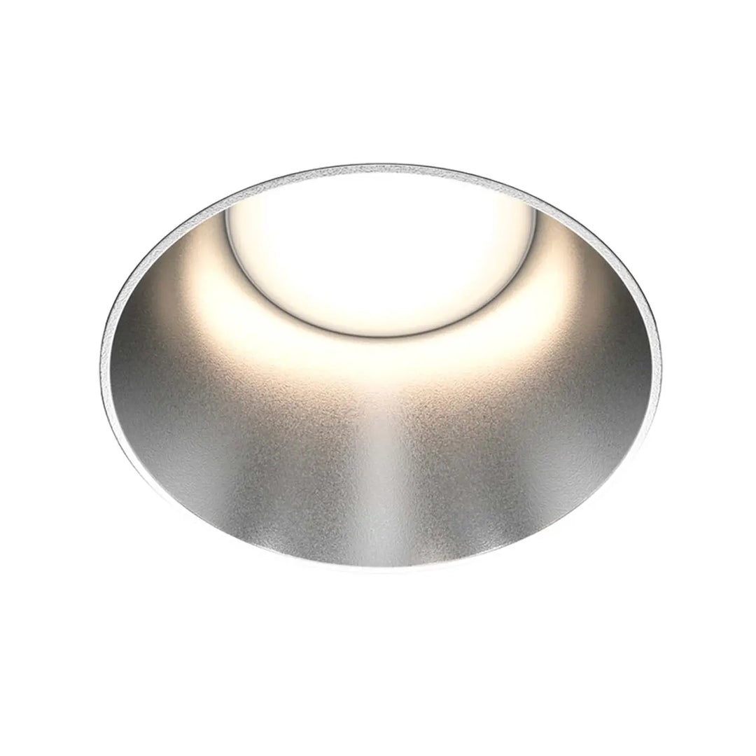 Spot share encastré rond en acier finition argentée avec collerette visible et ampoule led circulaire au centre style art déco
