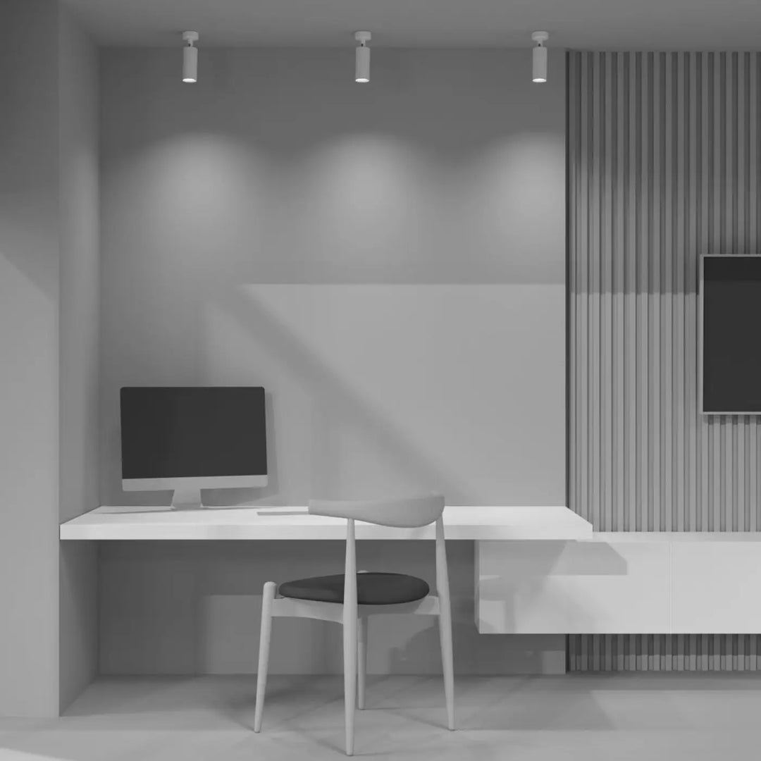 Minimalist bureau blanc avec base ronde et spot directionnel intégré pour un espace de travail moderne et fonctionnel