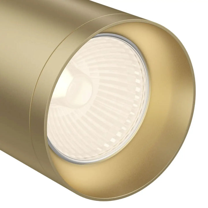 Spot focus directionnel cylindrique finition or avec lentille claire cannelée et base ronde pour éclairage ciblé