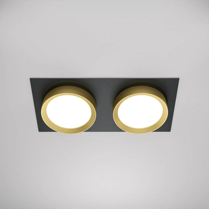 Modern spot hoop double plafonnier encastré avec deux luminaires circulaires dorés dans un cadre noir élégant