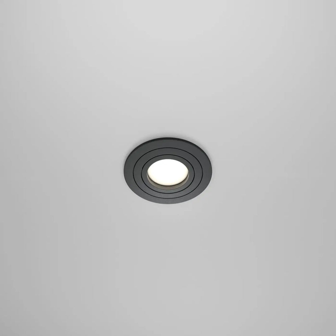 Spot encastrable rond noir avec ampoule gu10 orientable et centre lumineux blanc pour éclairage intérieur