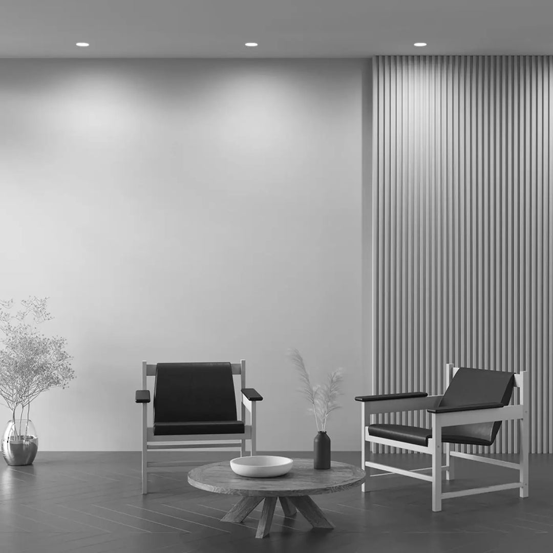 Minimalist white-framed armchairs with black leather upholstery in spot encastrable dot design