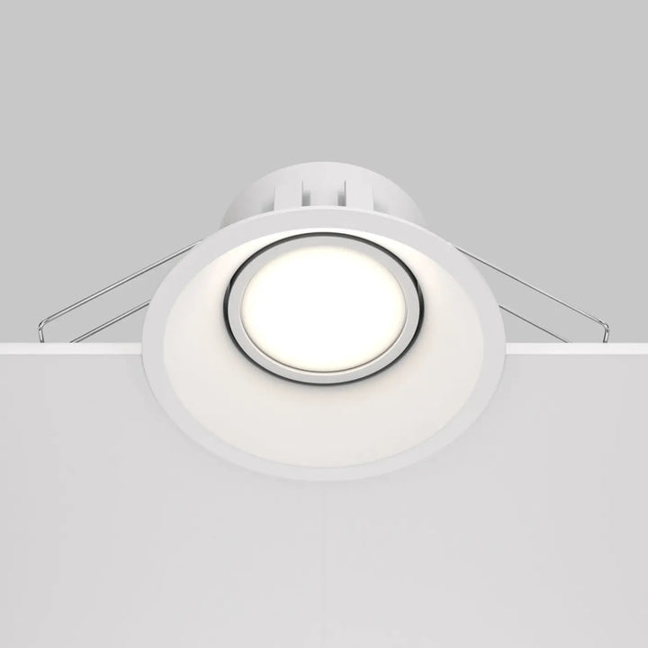 Spot encastrable dot rond blanc avec design circulaire élégant et bordure métallique pour éclairage plafond led