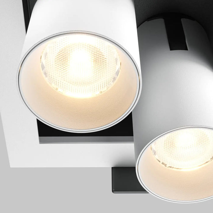 Spot magnum double est un spot encastrable cylindrique blanc avec lentille en verre dépoli et support noir