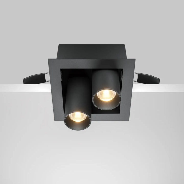 Spot magnum spot encastrable double en finition mate noire à deux têtes cylindriques avec lumière chaude intégrée