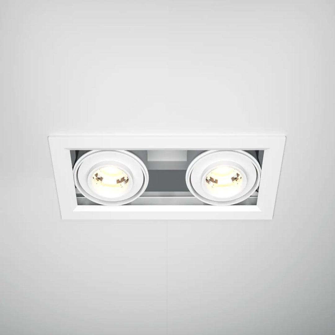 Spot metal modern double led encastré blanc avec deux ampoules led circulaires émettant une lumière chaude