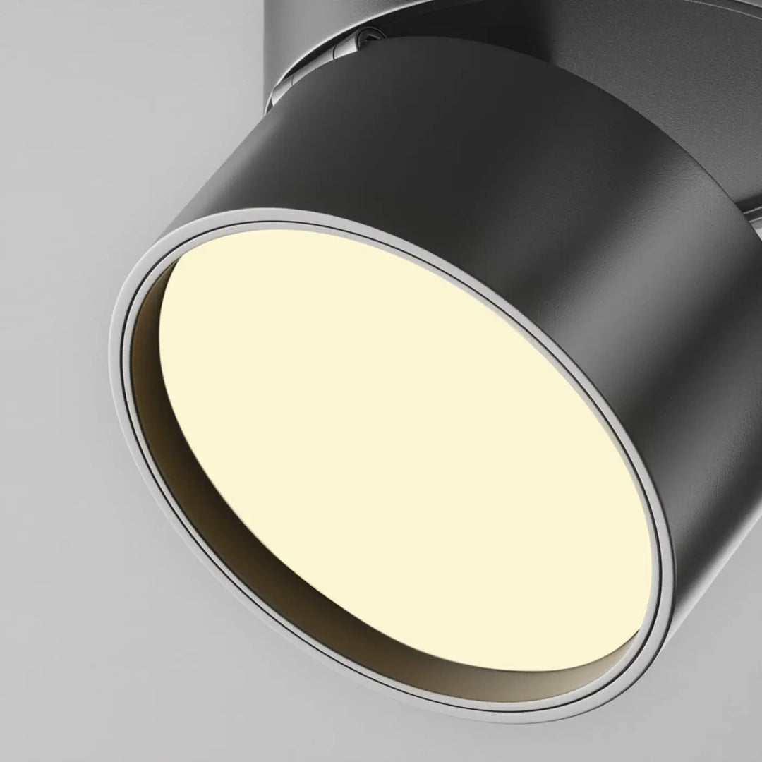 Spot onda disque rétractable noir cylindrique avec finition mate et lumière chaude diffuse pour spot encastrable