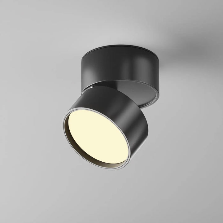 Spot onda disque rétractable noir cylindrique en métal avec lumière chaude diffuse pour usage encastrable