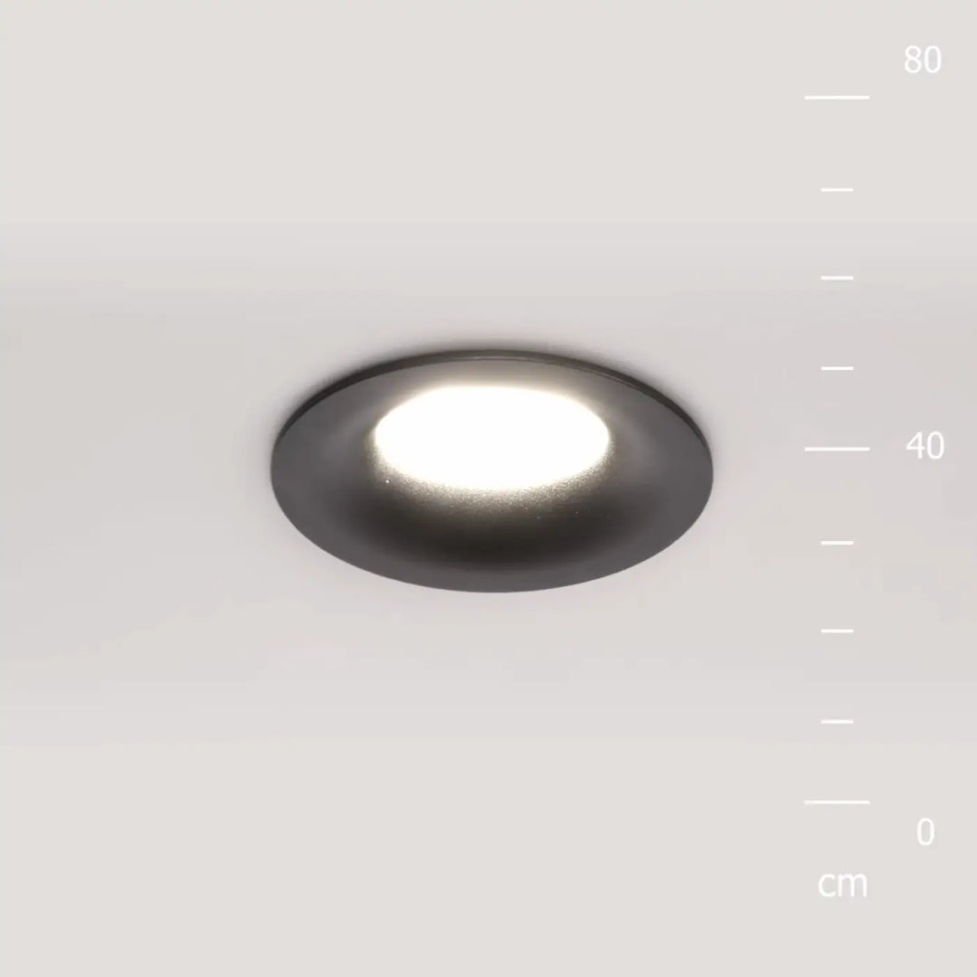 Spot encastré rond discret avec finition noire mate et éclairage général blanc doux circulaire