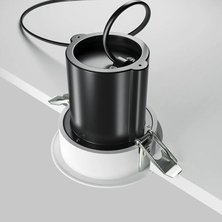 Spot hidden led rétractable en acier noir avec design cylindrique encastré noir et blanc pour plafond