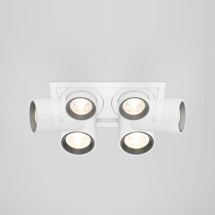 Spot hidden led rétractable en acier noir avec quatre spots ajustables à lumière chaude et design rectangulaire blanc