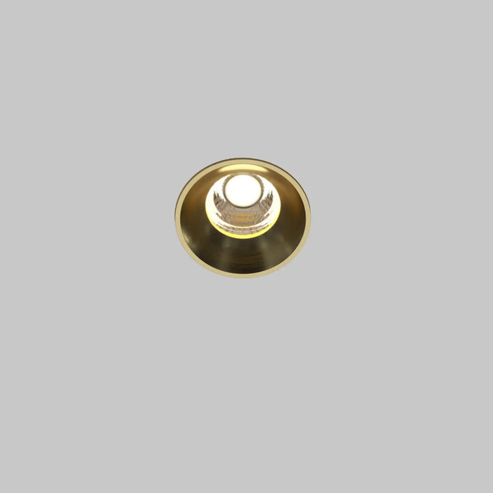 Spot led encastré rond compact avec finition laiton poli et ampoule led blanc chaud centrale
