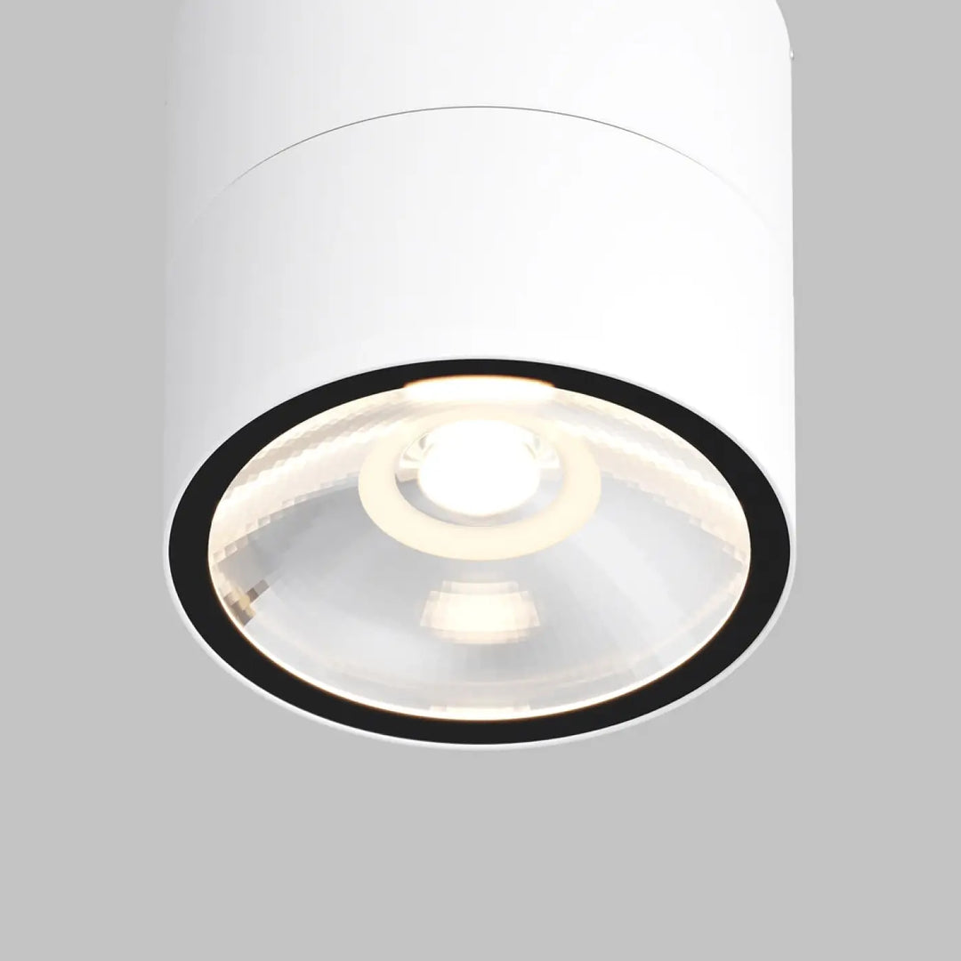 Spot spin led orientable encastré blanc cylindrique avec cadre noir et lentille en verre transparent