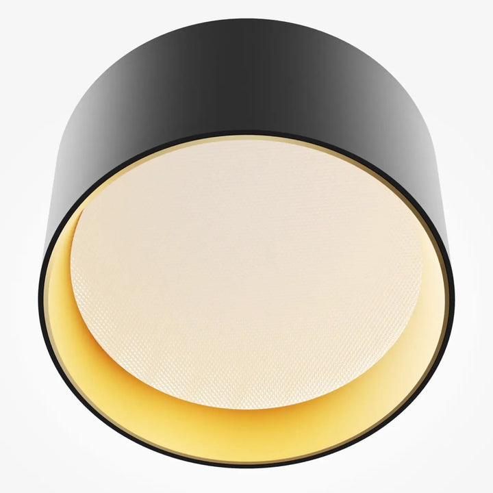 Spot vega led intégrée noir cylindrique avec anneau jaune chaud et diffuseur texturé off-white rond et saillie