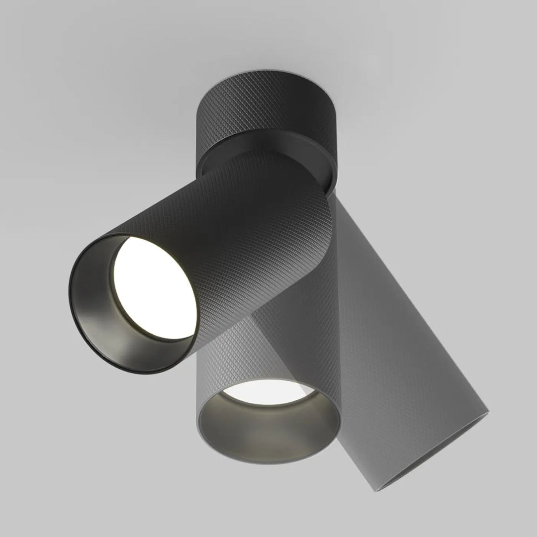 Spot orientable noir mat en aluminium texturé avec tête orientable cylindrique et deux faisceaux lumineux réglables