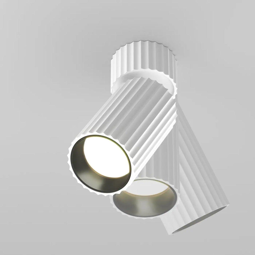 Spot orientable calipso cylindre cannelé blanc avec anneau métallique intérieur moderne et plafond monté