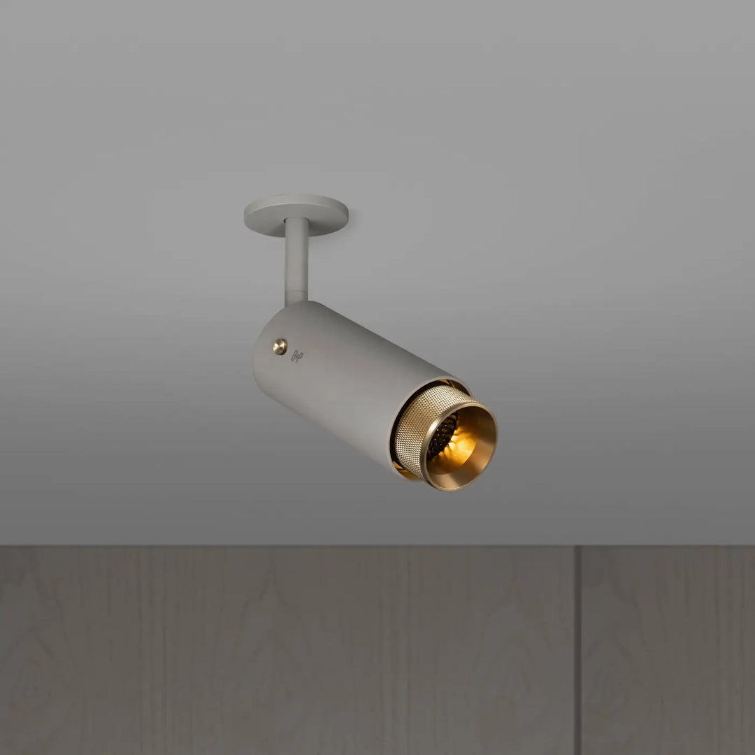 Spot orientable Exhaust à gravure quadrillée Pierre finition laiton #couleur_dor