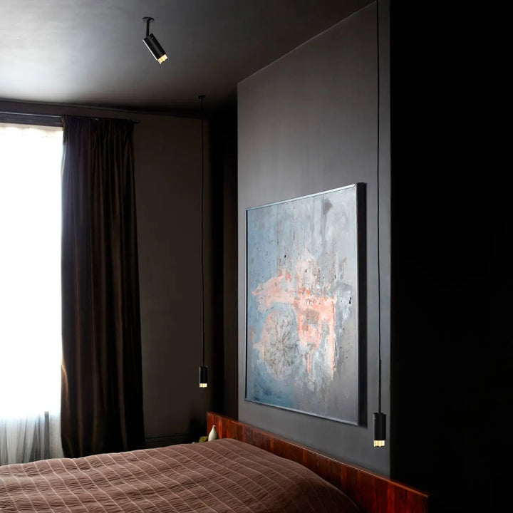 Spot orientable Exhaust Graphite finition laiton dans un intérieur #couleur_dor