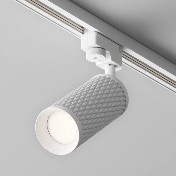 Spot orientable cylindrique blanc focus design avec tête texturée diamantée et bords arrondis lisses