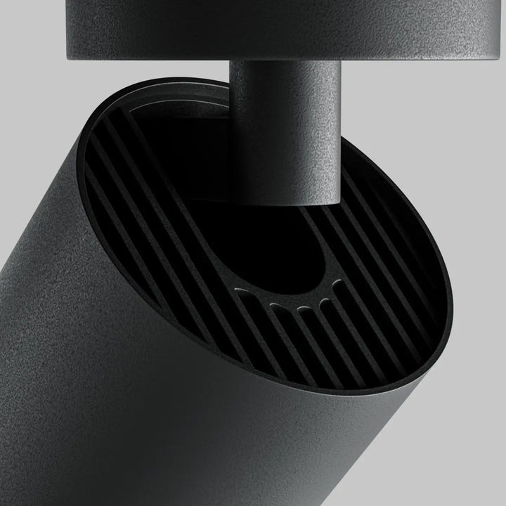Spot focus zoom cylindre mat noir avec intérieur nervuré pour un faisceau réglable orientable moderne