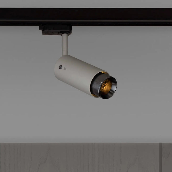 Spot sur rail Exhaust à gravure alignée Pierre, finition grise #couleur_gris