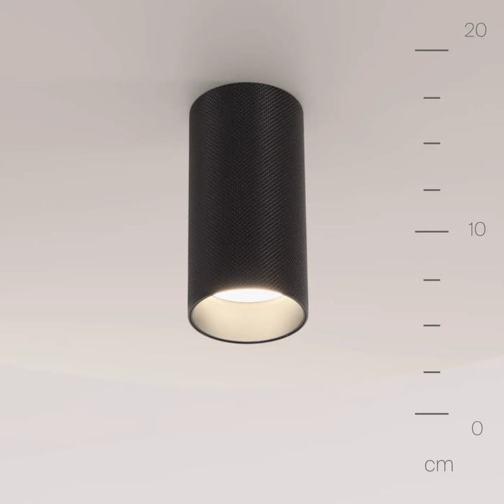 Spot artisan saillie luminaire plafond noir cylindrique en aluminium texturé avec culot gu10 et intérieur blanc chaud