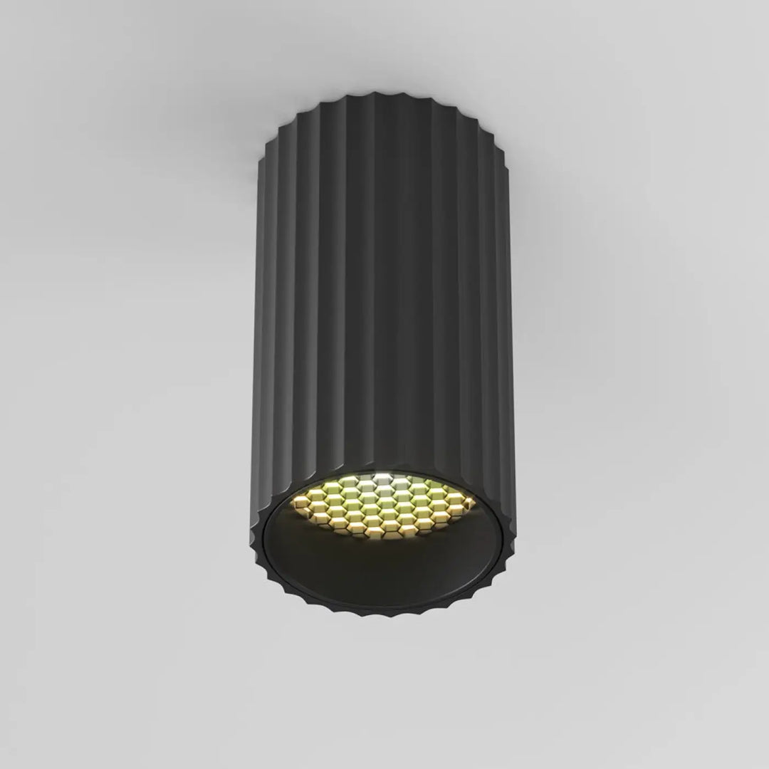 Spot calipso cylindre cannelé noir avec éclairage ciblé LED en nid dabeille et trois finitions disponibles