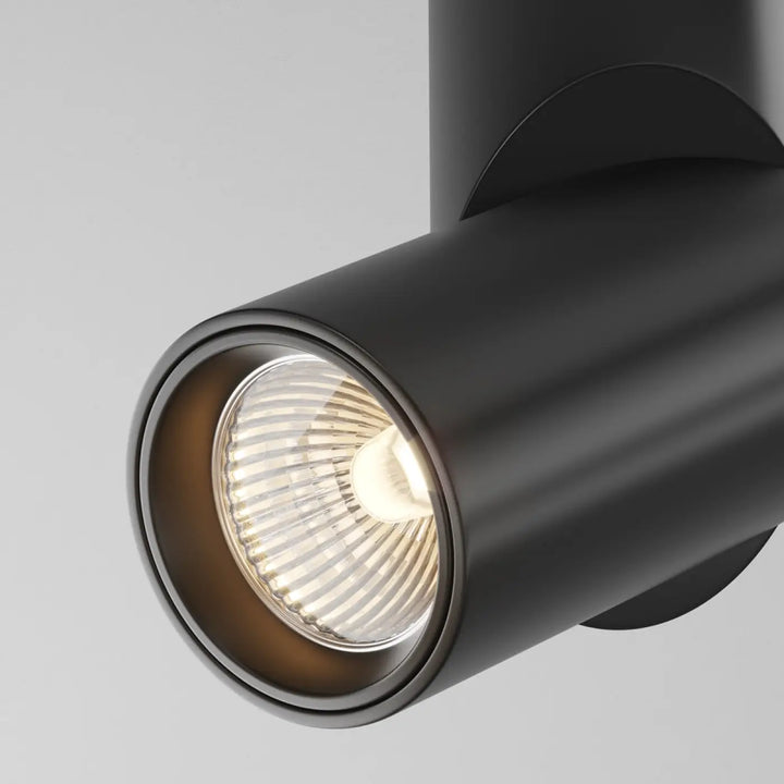 Spot dafne saillie led en aluminium noir avec finition mate cylindrique et ampoule led visible