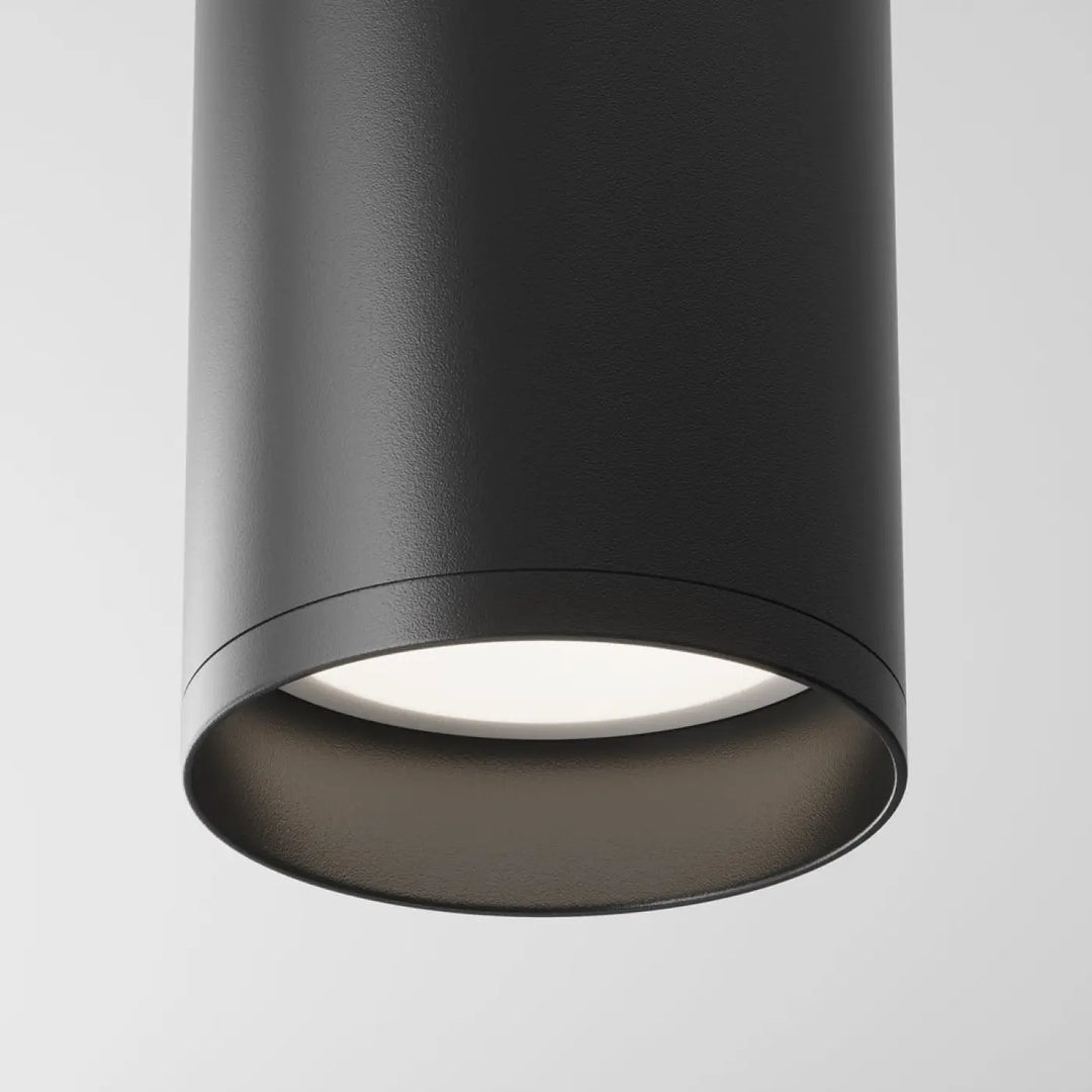 Spot focus cylindre black cylindrical ceiling light with matte finish and illuminated ampoule gu10 panel
