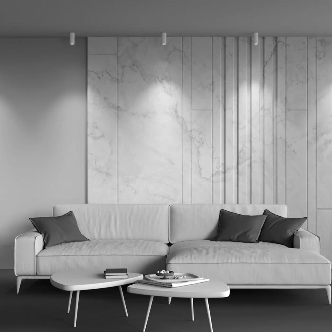 Canapé dangle moderne blanc avec coussins gris foncé et focus led intégrée version dimmable spot cylindre