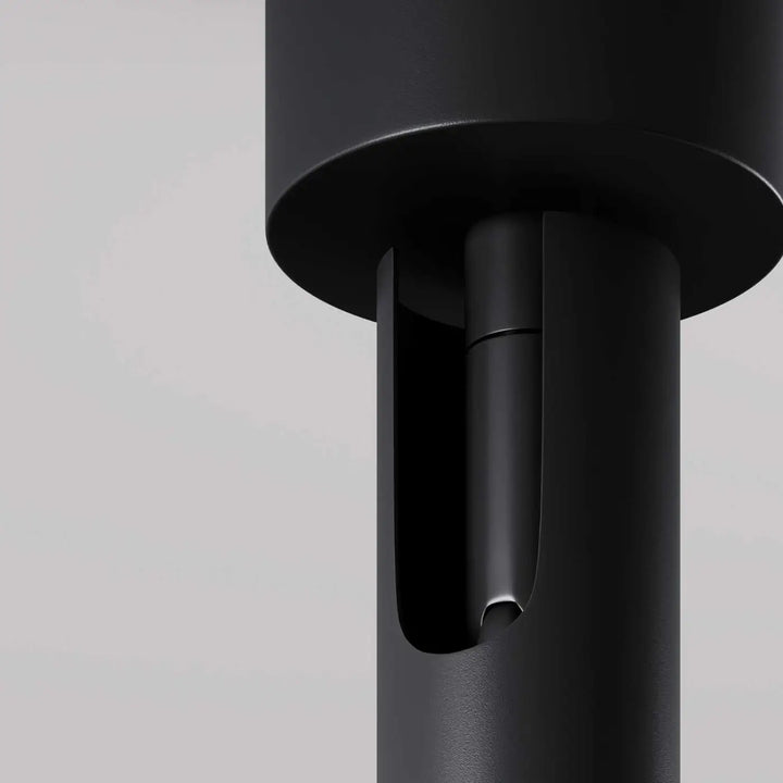Poteau en métal noir mat spot focus t led avec tube ultra-fin et base ronde intégrée à fente verticale