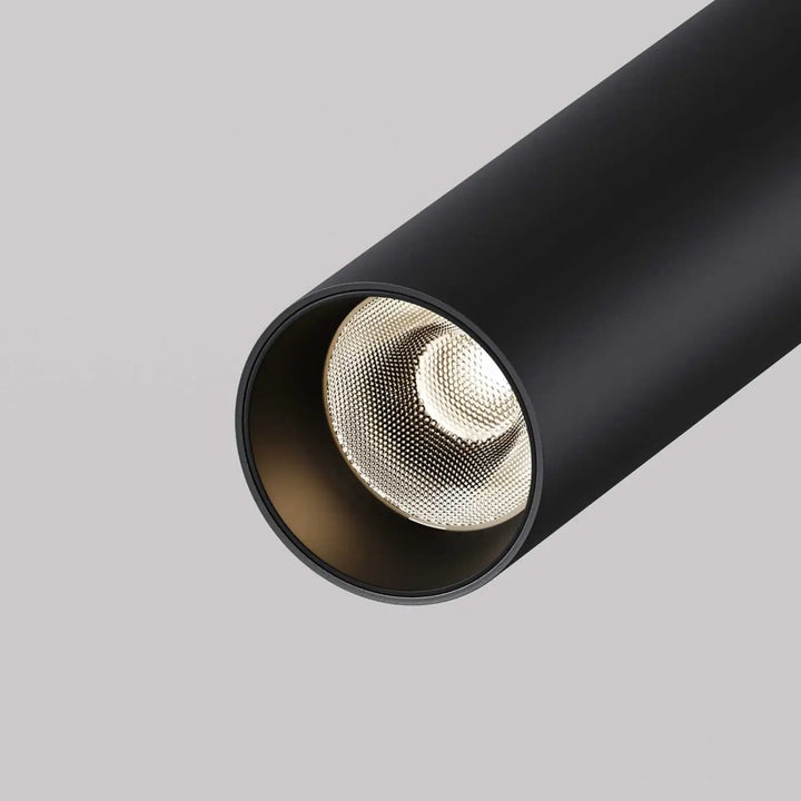 Spot focus t led tube ultra-fin noir mat avec diffuseur perforé doré base ronde pour éclairage sur rail