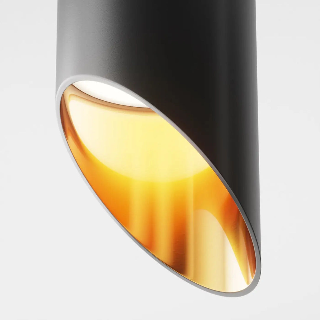 Spot lipari long cylindre acier noir avec intérieur ambré chaud et finition métallique pour éclairage suspendu