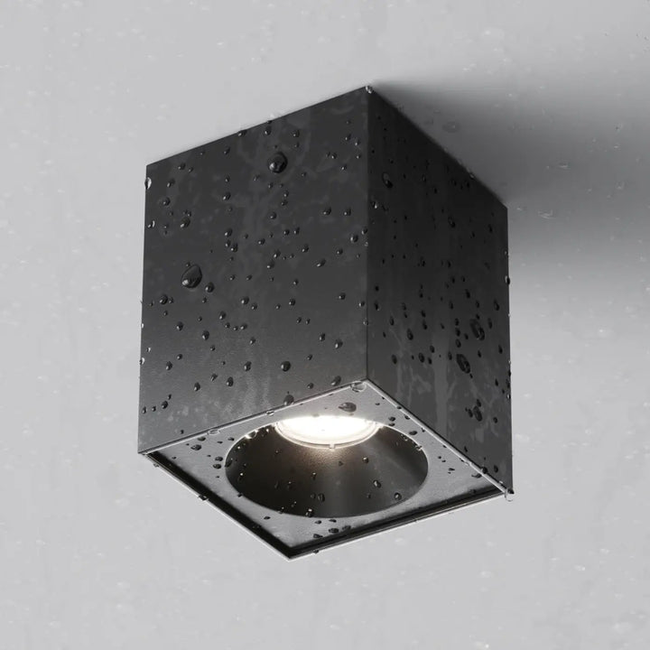 Spot zoom carré en saillie noir mat avec centre circulaire lumineux idéal pour éclairage moderne intérieur
