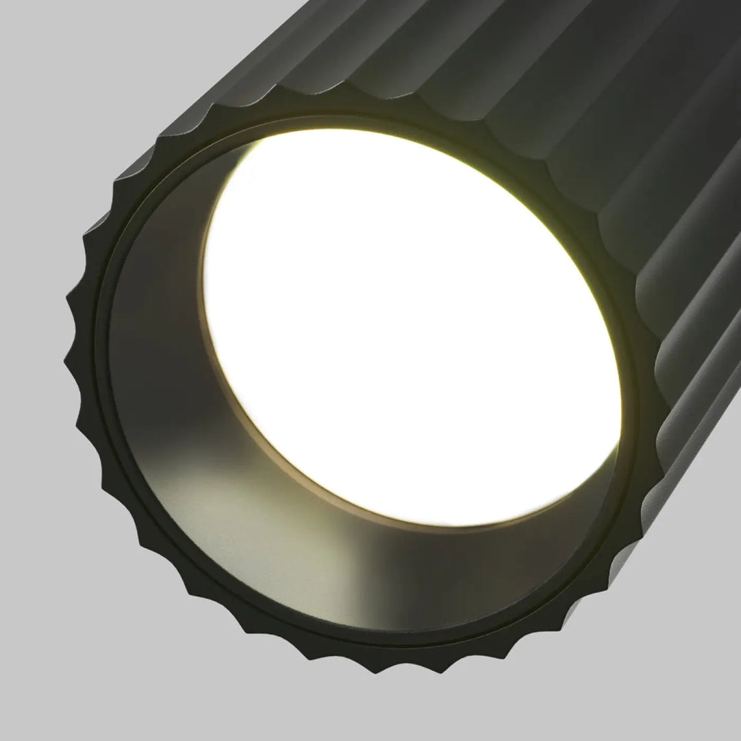 Spot semi-encastré calipso cylindre cannelé noir avec face éclairée blanche brillante pour éclairage intérieur