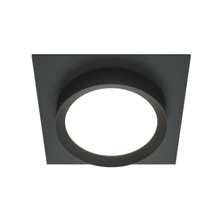 Spot semi-encastré cadre carré noir avec disque lumineux circulaire au centre pour éclairage intérieur