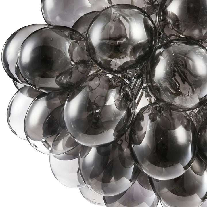 Suspension luminaire balbo en verre fumé couleur nickel composée de sphères translucides idéale pour salle à manger
