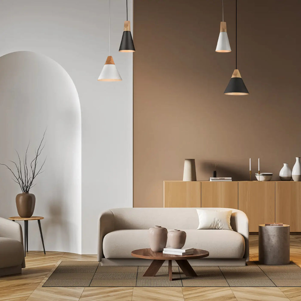 Sofa beige en tissu avec design minimaliste et pieds en bois parfait pour une salle à manger moderne au-dessus d’une table