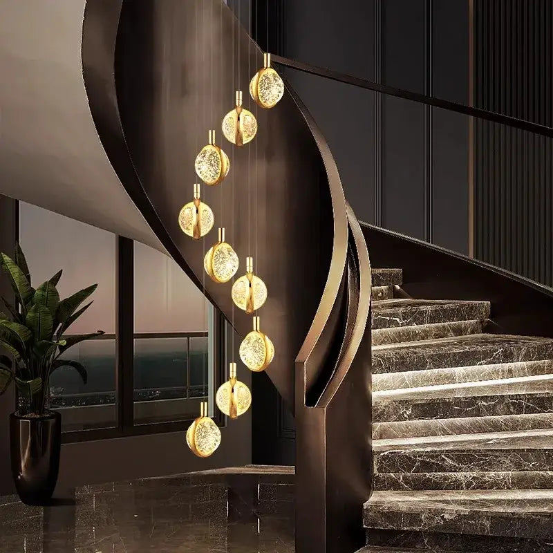 Suspension Cascade Dorée à Disques Cristal Design Luxueux

