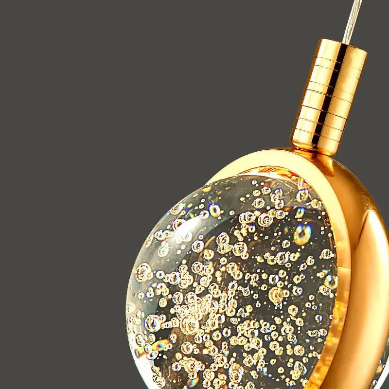 Suspension Cascade Dorée à Disques Cristal Design Luxueux

