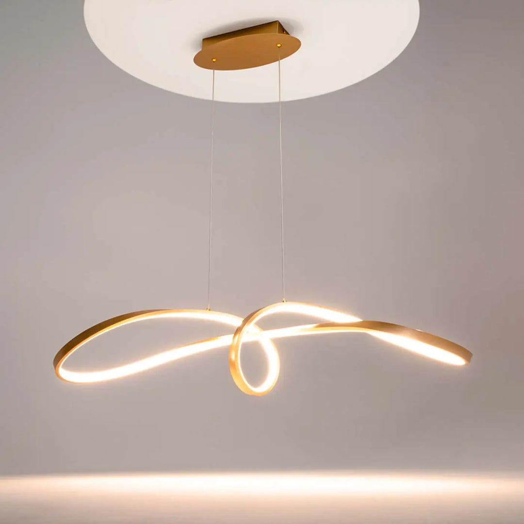 Suspension luminaire curve avec design nœud infini en aluminium noir et finition dorée éclat chaud contemporain
