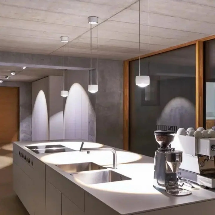 Suspension cylindrique moderne à multiples hauteurs pour salon chic