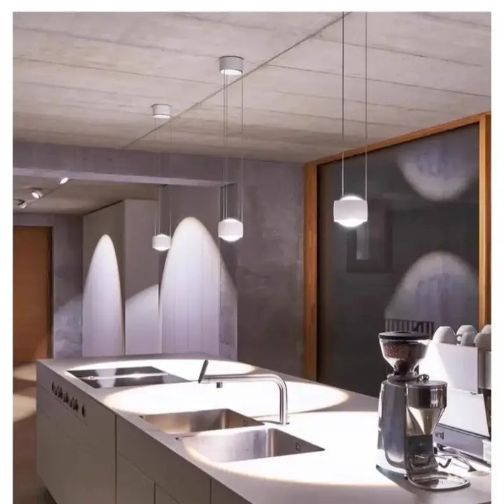 Suspension cylindrique moderne à multiples hauteurs pour salon chic