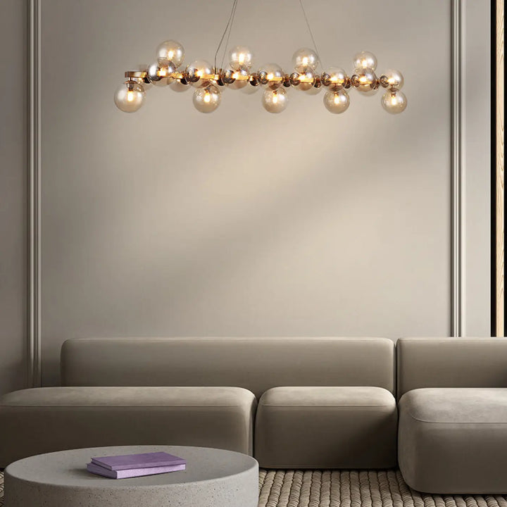 Suspension luminaire dallas couronne en métal doré avec onze globes en verre sphériques style art déco en ligne