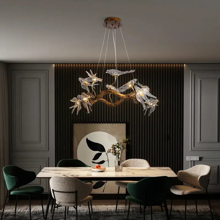 Suspension design branche dorée avec oiseaux en verre