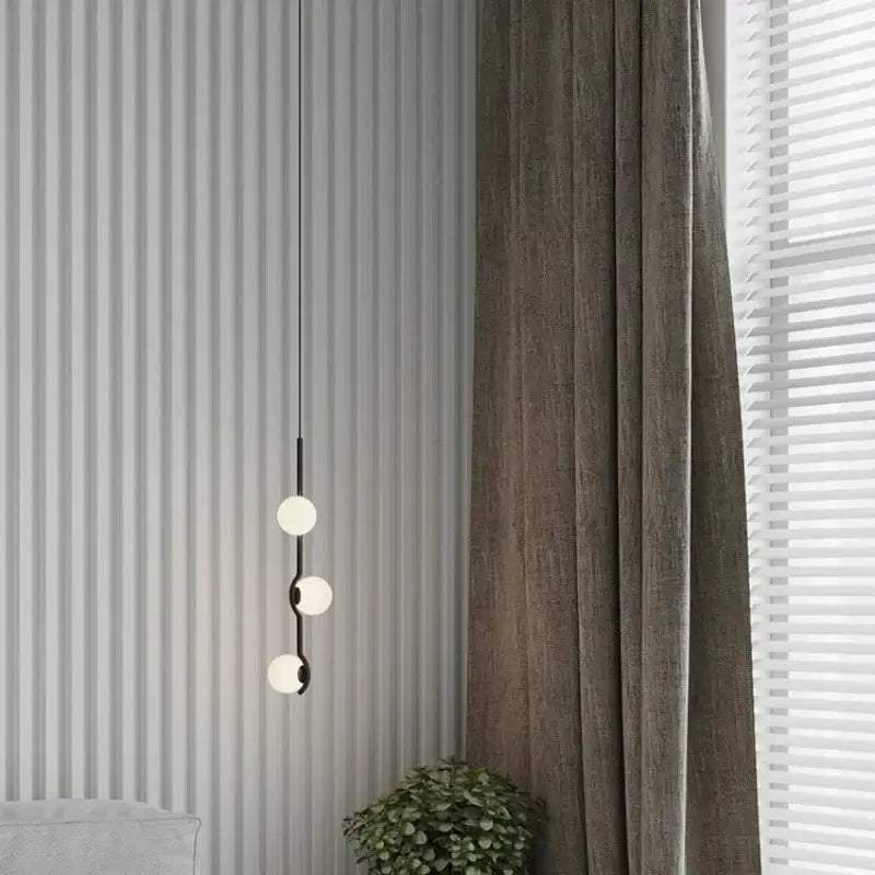 Suspension minimaliste à boules lumineuses style chic